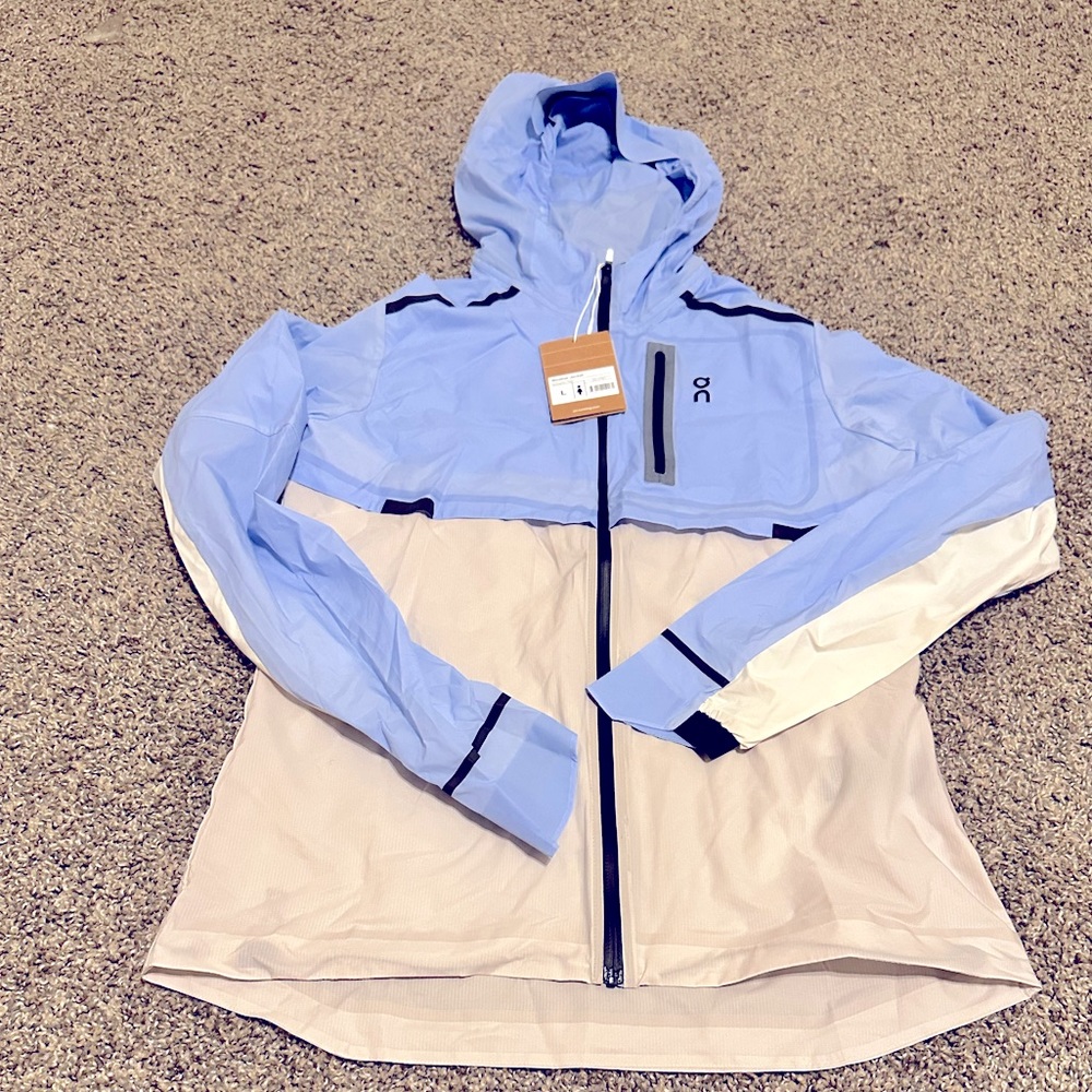 On Running Women’s large Weather Jacket  Stratosphere/Pearl brand New with tags
